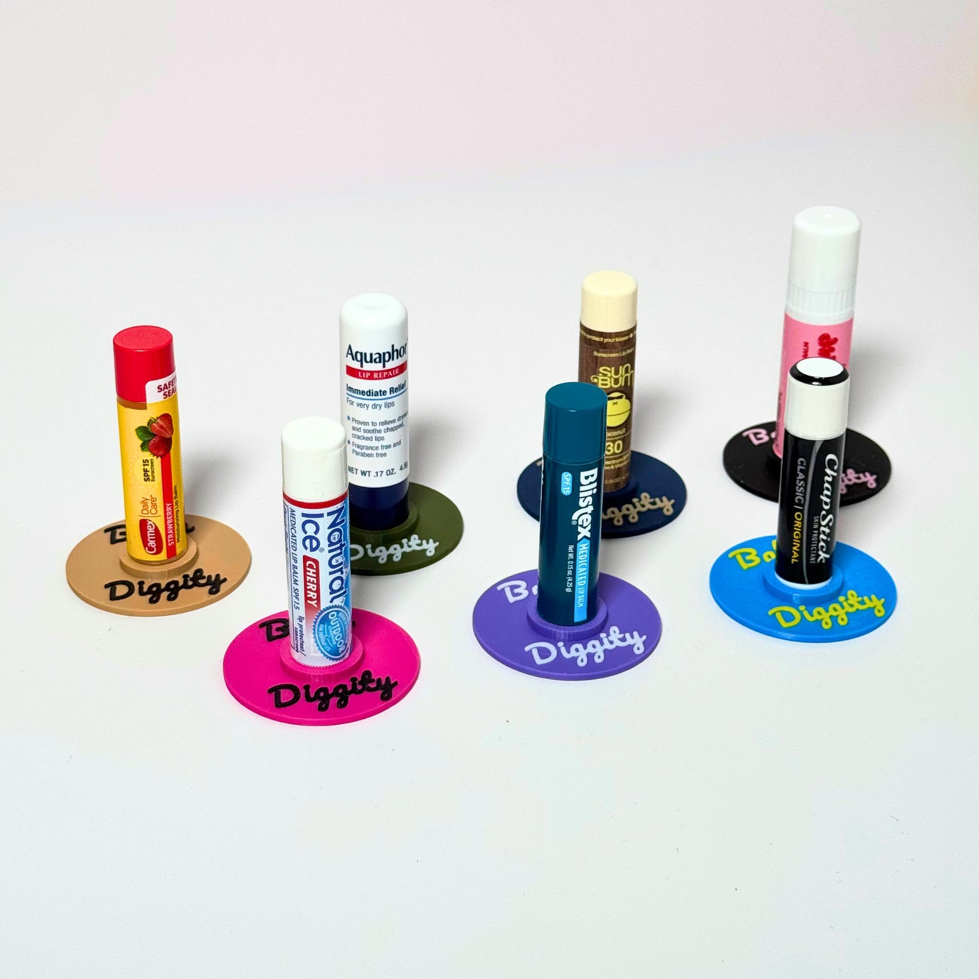 Seven vibrant color combinations of the vinyl record lip balm holders