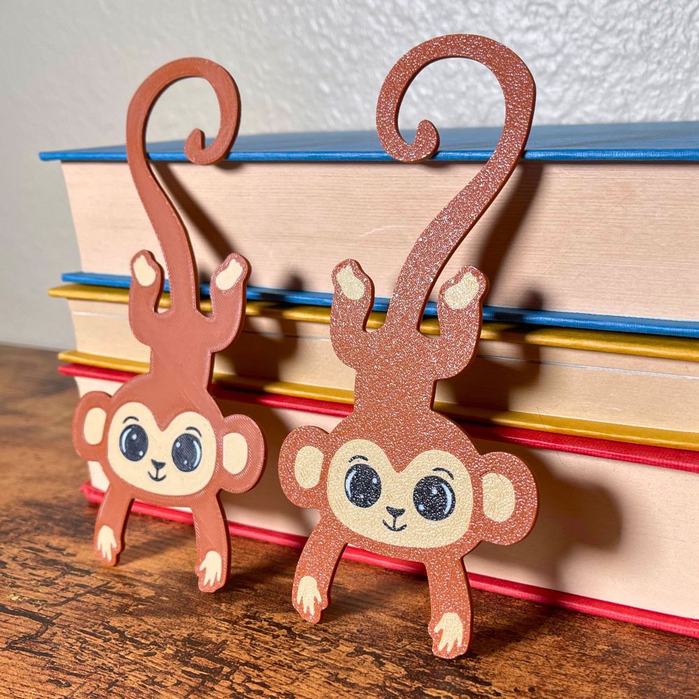 Monkey bookmarks shown from both sides with slightly different textures
