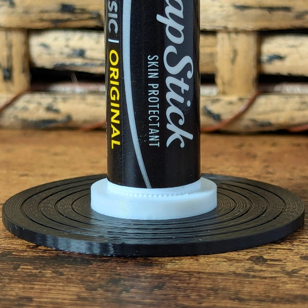 White and black vinyl record lip balm holder