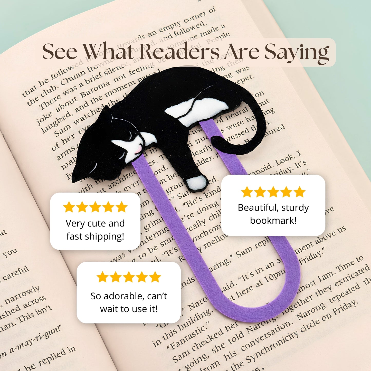 A black and white cat-shaped bookmark with purple clip placed on an open book. The image includes promotional text reading 'See What Readers Are Saying' and three review bubbles with 5 star ratings and customer feedback.