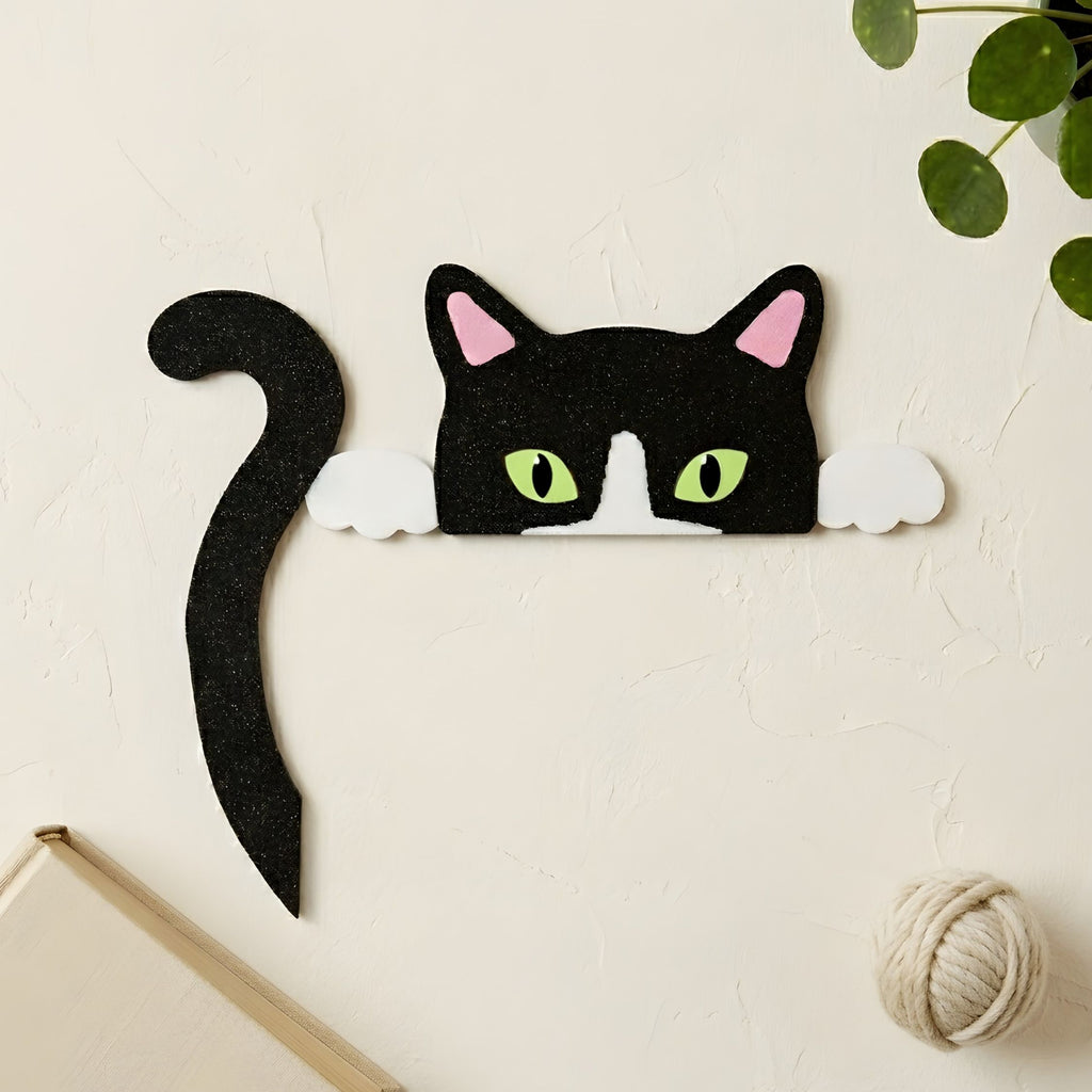 Tuxedo cat wall decor variant with green eyes, black glitter tail curving below the peeking face