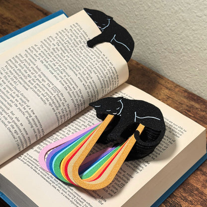 Close up of adorable black cat-themed bookmarks in eleven color variations