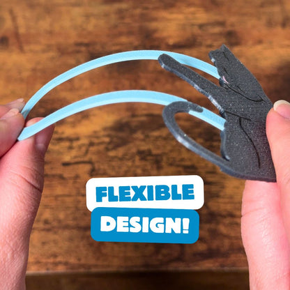 Grey cat bookmark being bent, showing off its flexible design