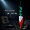 Glow in the dark fingerprints glowing teal on the knife ornament in a dim crime scene setup