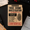 Closed Chain of Custody case file lid on a dark desk with case notes, an evidence sheet, and holiday greenery