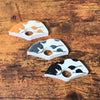 The front of the spotted cat page holders on a wooden table from the top view