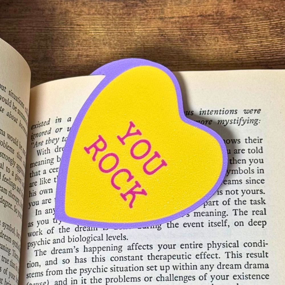 Sweet yellow bookmark heart that reads You Rock inside a open book