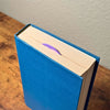 Sweet bookmark heart inside a closed book