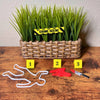 True crime scene plant decor set with a crime scene plant stake, body outline, bloody knife, blood pile, and scene markers