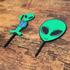 Fun alien head and alien in a Hawaiian t-shirt plant stakes